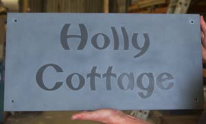 Slate sign - raised letters no paint. Holly Cottage. Font  - Cameric