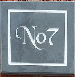 Slate house number sign