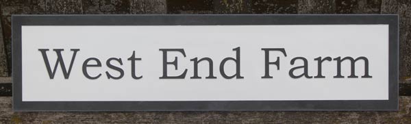 White painted slate house sign with raised letters. Font Bookman Old Style. Size 150mm x600mm