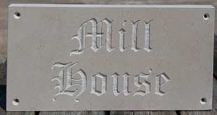 Unpainted stone sign