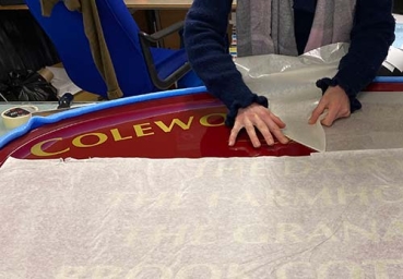 Vinyl Application Vinyl being applied in the workhop