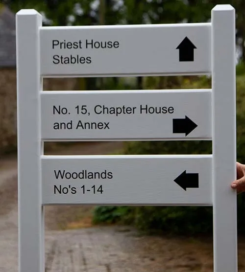 This ladder sign has been morticed into the posts Painted Harwood Ladder Sign