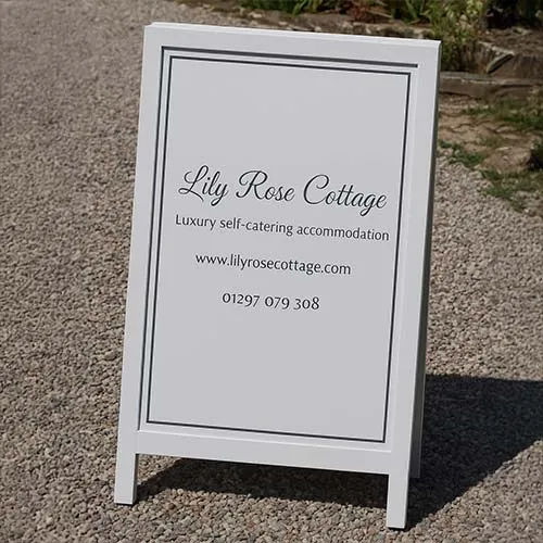 Painted harwood frame with painted lettering