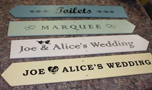 Painted wedding or event directional signs