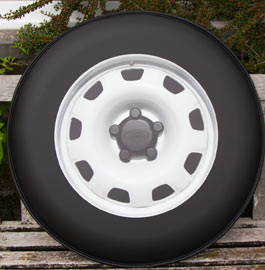 Wheelcover covered in a matt black wrap vinyl before full colour print applied.
