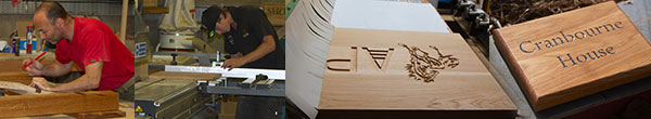 Carpenters at working making the wooden signs.
