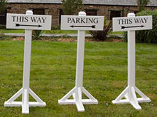 Free standing painted wooden signs.