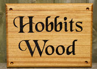 Iroko wood sign for easy maintenance. Iroko wood sign for easy maintenance.