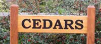 Iroko wood entrance sign with morticed joints Iroko wood entrance sign with morticed joints