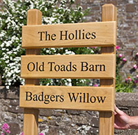 Front fixed wooden ladder sign made from oak and satin varnished. Front fixed wooden ladder sign made from oak and satin varnished.