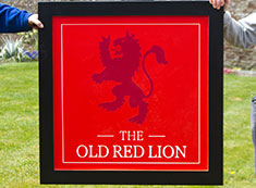 Framed sign for a pub. Framed sign for a pub.