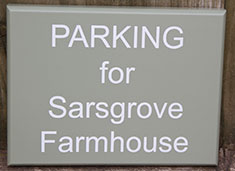 Painted wooden sign. Painted wooden sign.