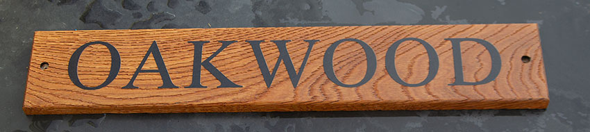 Oak sign sandblasted for driftwood effect.