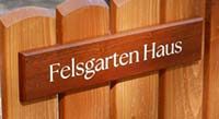 Sapele wood house sign. Sapele wood house sign.