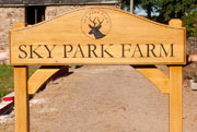 Beautiful farm sign on posts.