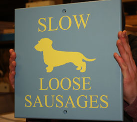 Painted sign board in Stone blue and yellow