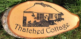 Wooden house sign with customers own artwork