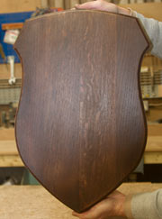 Shields for Trophies made from chunky wood in mahogany and light wood 