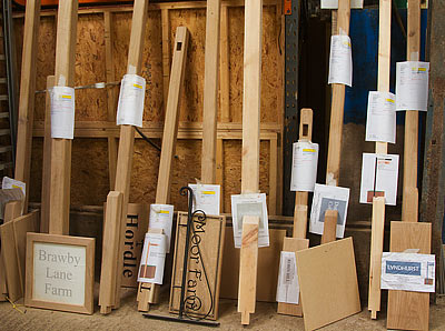 Batch of wooden signs in the workshop waiting to go into sprayroom Batch of wooden signs in the workshop waiting to go into sprayroom